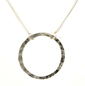 Silver round washer type hammered effect pendant