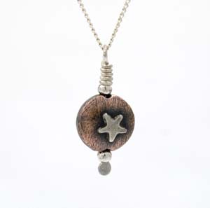 Puffed 3D  copper pendant with silver star